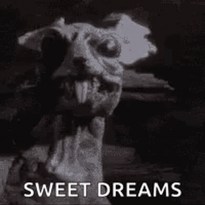 A Black And White Photo Of A Gargoyle With The Words `` Sweet Dreams '' Written Next To It . GIF