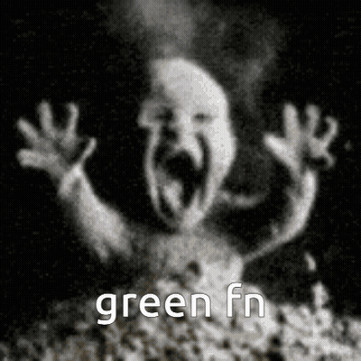 A Black And White Photo Of A Ghost With A Screaming Face And The Words `` Green Fn '' Below It . GIF