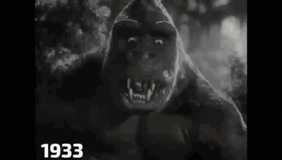 A Black And White Photo Of A Gorilla In A Movie . GIF
