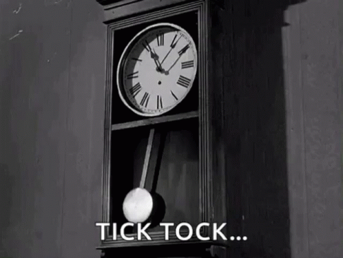 A Black And White Photo Of A Grandfather Clock With The Words Tick Tock Below It GIF