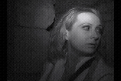 A Black And White Photo Of A Gray Background With A Few Lines On It . GIF