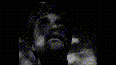 A Black And White Photo Of A Grid With Squares In It GIF