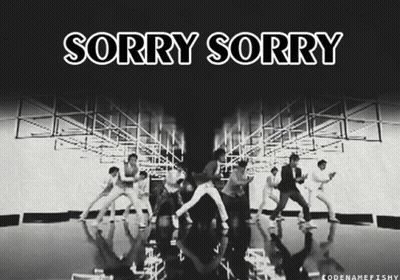 A Black And White Photo Of A Group Of Dancers With The Words Sorry Sorry Above Them GIF