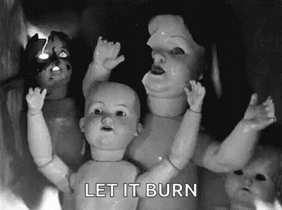 A Black And White Photo Of A Group Of Dolls With The Words Let It Burn Below Them GIF