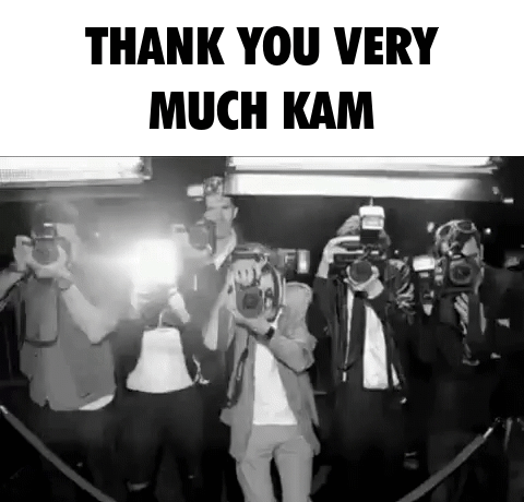 A Black And White Photo Of A Group Of People Taking Pictures With The Words Thank You Very Much Kam Above Them GIF
