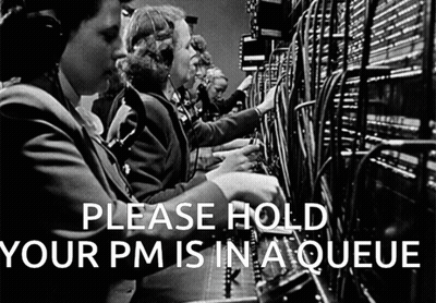 A Black And White Photo Of A Group Of Women Working On Telephones With The Words Please Hold Your Pm Is In A Queue GIF