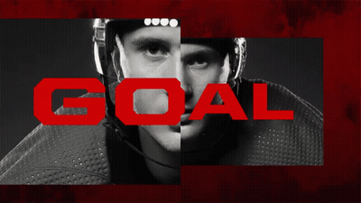 A Black And White Photo Of A Hockey Player With The Word Goal In White GIF