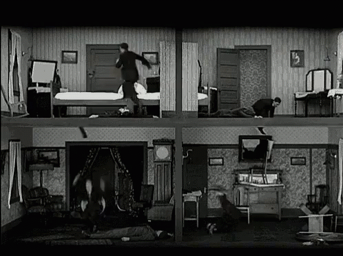 A Black And White Photo Of A House With Many Rooms And People . GIF