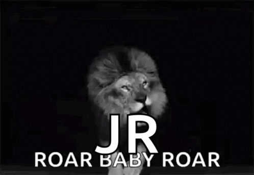 A Black And White Photo Of A Lion With The Words `` Jr Roar Baby Roar '' Written On It . GIF