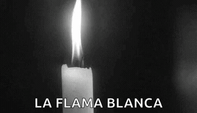 A Black And White Photo Of A Lit Candle With The Words La Flama Blanca Written On The Bottom GIF