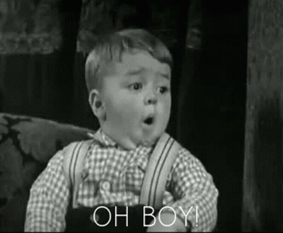 A Black And White Photo Of A Little Boy Making A Funny Face And Saying Oh Boy . GIF