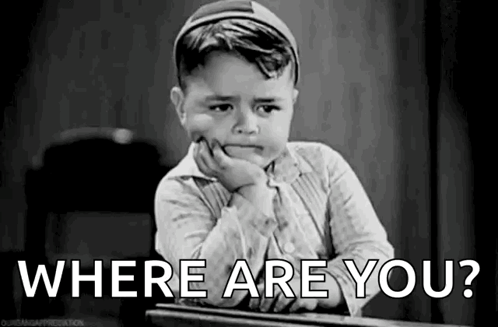 A Black And White Photo Of A Little Boy Sitting At A Desk With His Hand On His Chin And The Words `` Where Are You ? '' GIF