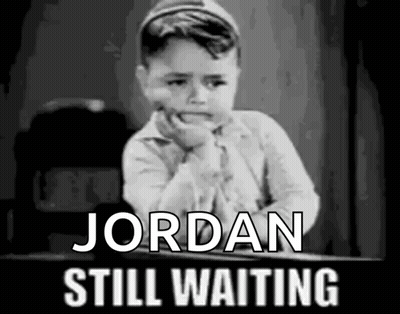 A Black And White Photo Of A Little Boy With The Words Jordan Still Waiting Below Him GIF