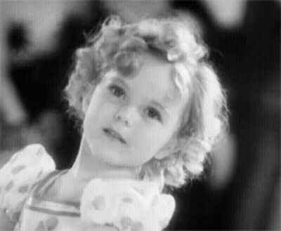 A Black And White Photo Of A Little Girl GIF