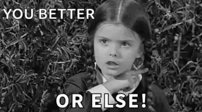 A Black And White Photo Of A Little Girl Pointing At The Camera And Saying `` You Better Or Else '' . GIF
