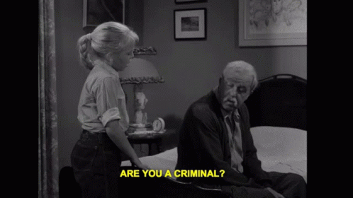 A Black And White Photo Of A Man And A Girl With The Words Are You A Criminal On The Bottom GIF
