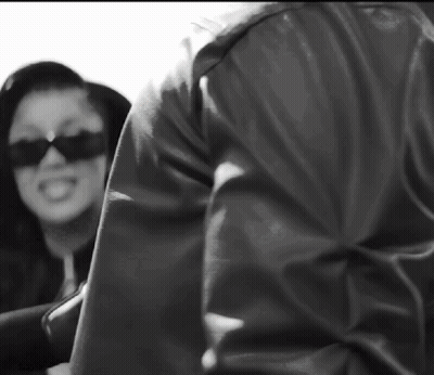 A Black And White Photo Of A Man And A Woman GIF