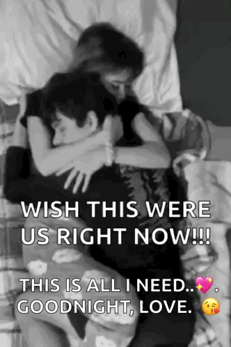 A Black And White Photo Of A Man And A Woman Hugging Each Other . GIF