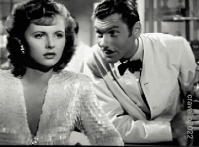 A Black And White Photo Of A Man And A Woman Taken By Crawford 2002 GIF