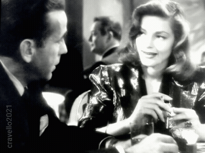 A Black And White Photo Of A Man And A Woman With A Caption That Says Cravell21 GIF
