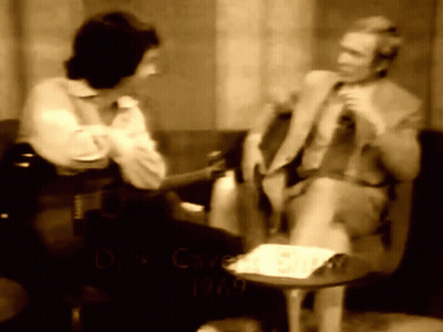 A Black And White Photo Of A Man And A Woman With The Year 1969 GIF