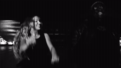 A Black And White Photo Of A Man And Woman Dancing GIF