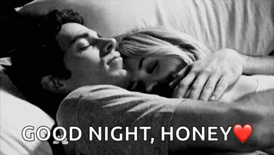 A Black And White Photo Of A Man And Woman Hugging In Bed With The Words Good Night Honey GIF