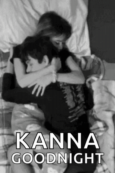 A Black And White Photo Of A Man And Woman Hugging With The Caption " Kanna Goodnight " . GIF