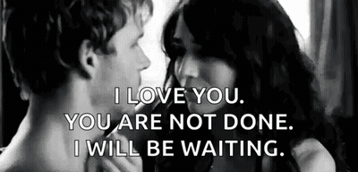 A Black And White Photo Of A Man And Woman Kissing With A Quote . GIF