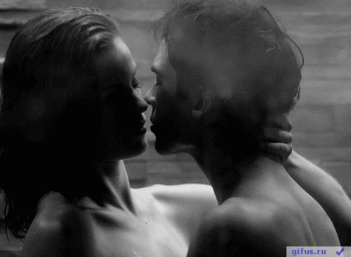 A Black And White Photo Of A Man And Woman Kissing With Gifus.ru In The Bottom Right Corner GIF