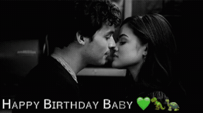 A Black And White Photo Of A Man And Woman Kissing With The Words " Happy Birthday Baby " Above Them GIF