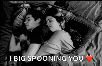 A Black And White Photo Of A Man And Woman Sleeping On A Bed With The Caption I Big Spooning You . GIF