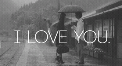 A Black And White Photo Of A Man And Woman Under An Umbrella With The Words I Love You GIF
