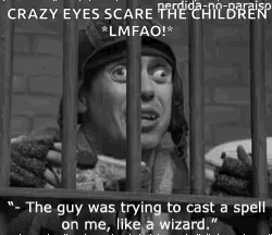 A Black And White Photo Of A Man Behind Bars With A Caption That Says Crazy Eyes Scare The Children GIF