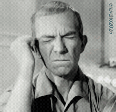 A Black And White Photo Of A Man Covering His Ear With His Hands And The Year 2025 On The Bottom GIF