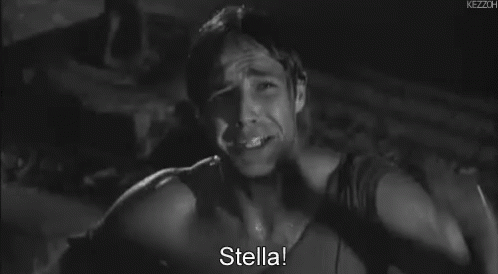 A Black And White Photo Of A Man Crying With The Words `` Stella '' Written Above Him . GIF