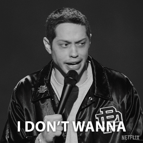 A Black And White Photo Of A Man Holding A Microphone With The Words I Don T Wanna GIF