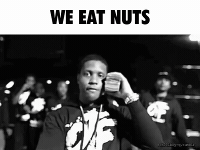 A Black And White Photo Of A Man Holding A Stack Of Money With The Words We Eat Nuts Below Him GIF