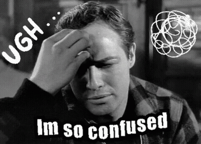 A Black And White Photo Of A Man Holding His Head With The Words Im So Confused Below Him GIF