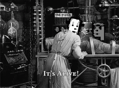 A Black And White Photo Of A Man In A Lab With The Words `` It 'S Alive '' On The Bottom . GIF