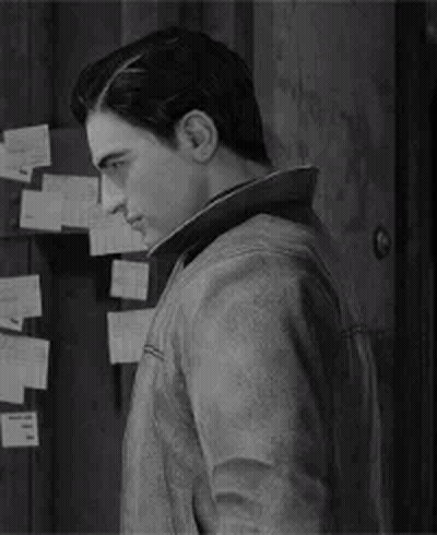 A Black And White Photo Of A Man In A Leather Jacket Standing In Front Of A Wall Covered In Sticky Notes . GIF