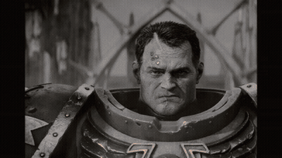 A Black And White Photo Of A Man In A Robot Costume Looking At The Camera . GIF