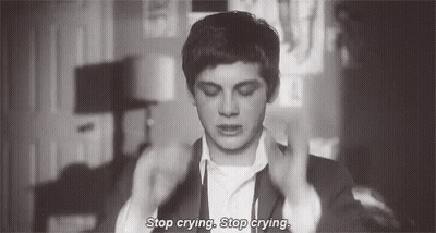 A Black And White Photo Of A Man In A Suit And Tie Saying `` Stop Crying , Stop Crying . '' GIF