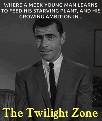 A Black And White Photo Of A Man In A Suit And Tie With A Caption That Says The Twilight Zone GIF