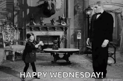 A Black And White Photo Of A Man In A Tuxedo And A Little Girl Dancing In A Living Room . GIF