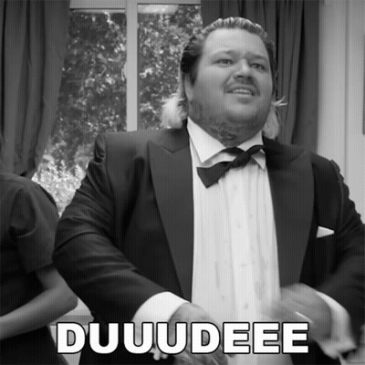 A Black And White Photo Of A Man In A Tuxedo With The Word Duuudee On The Bottom GIF