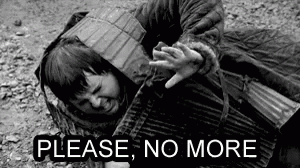 A Black And White Photo Of A Man Laying On The Ground With The Words `` Please No More '' . GIF