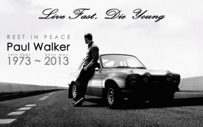 A Black And White Photo Of A Man Leaning Against A Car With The Words Rest In Peace Paul Walker 1973-2013 GIF