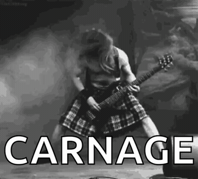 A Black And White Photo Of A Man Playing A Guitar With The Word Carnage Written Below Him GIF