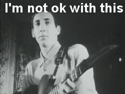 A Black And White Photo Of A Man Playing A Guitar With The Words I 'M Not Ok With This Above Him GIF
